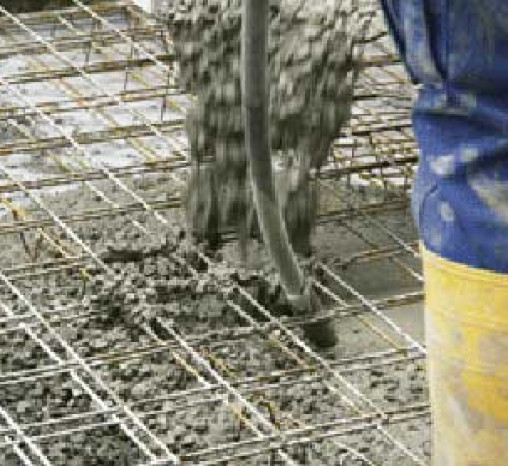 Concrete foundation being poured