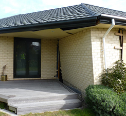 Earthquake-damaged brick house