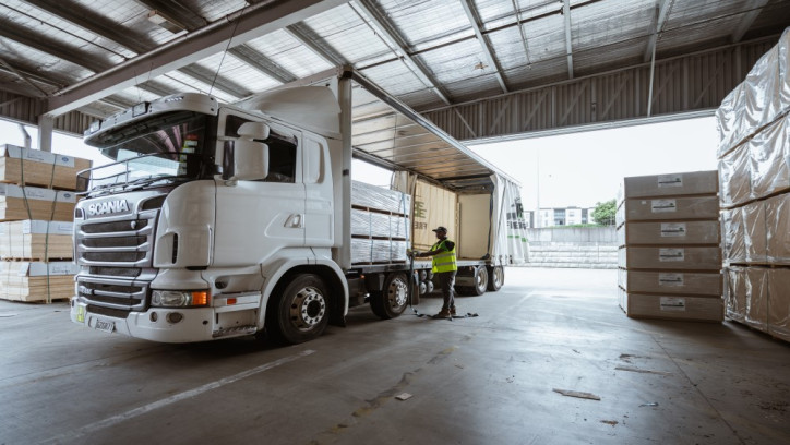 Semi truck being loaded at a wholesaler or distributor centre