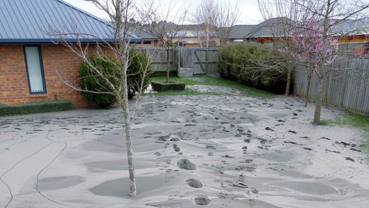 Liquefaction in backyard of a house