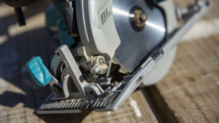 Circular saw cutting timber