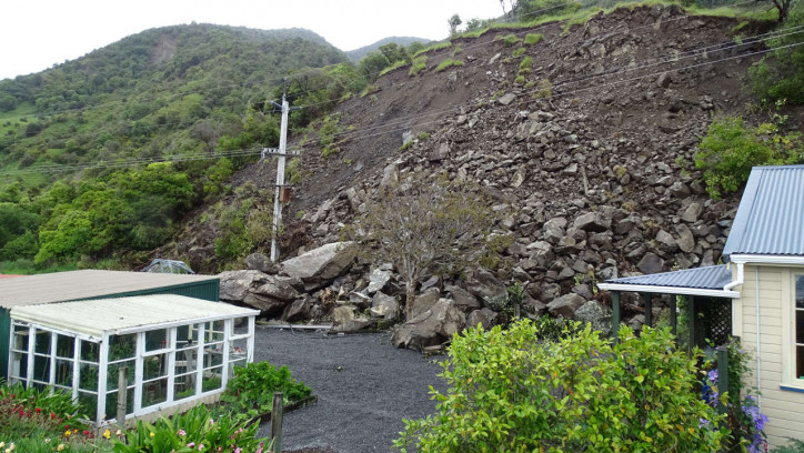 Hillside slip near houses