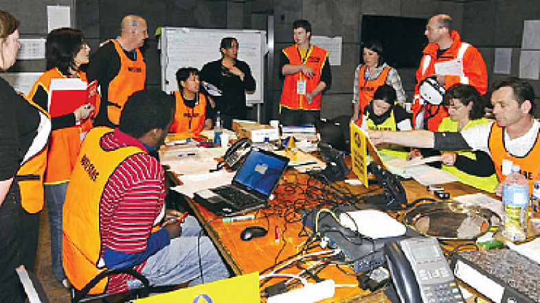 Emergency workers in a control room