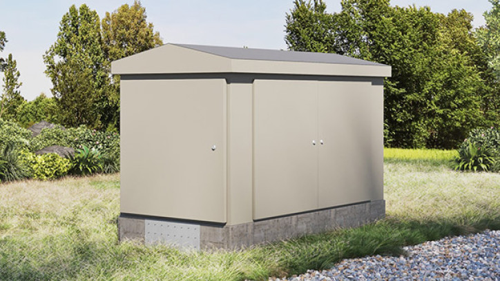 Concrete plinth supporting a utility cabinet