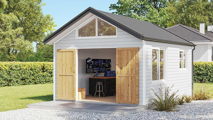 Small detached building in yard.